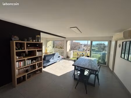 appartement 97m2 + cave + garage dans résidence fermée