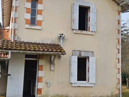 maison à rénover avec garage et grand terrain