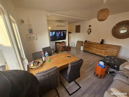 t2 49 m² mauguio centre – clim – parking – cuisine équipée