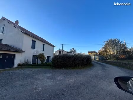 maison mitoyenne avec garage et terrain