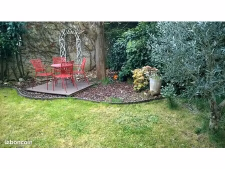 jolie appartement en rez-de-jardin 57 m2 + 12 m2 (véranda chauffée)