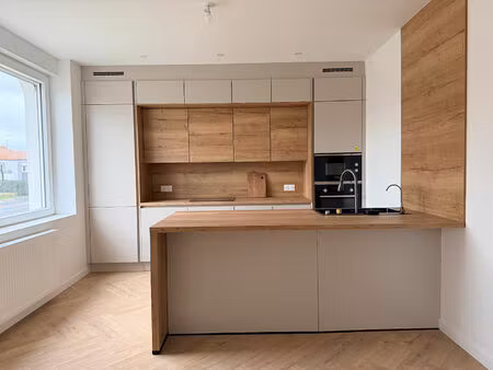 à vendre à terville : maison des années 30 rénovée avec prestations contemporaines