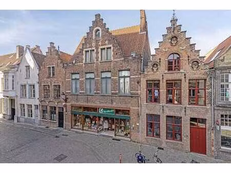 propriété commerciale avec maison à vendre à bruges