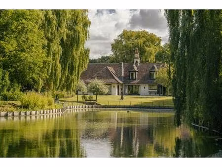 unieke villa met vijver te koop aan de rand van roeselare