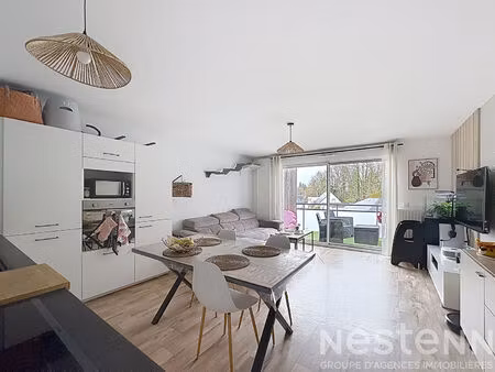 appartement - 62m² - 2 chambres - balcon - stationnement couvert