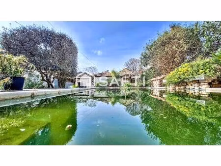 maison de 105m² avec piscine sur parcelle de 500m² de terrain paysagé  au calme d'une impa