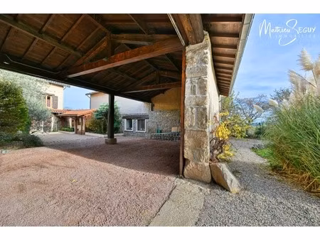 thurins - propriété avec terrain  dépendance et garages en limite de zone agricole