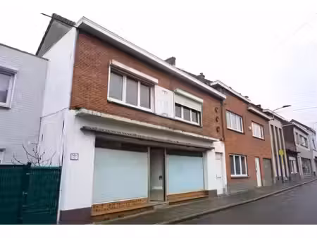 compromis signe-maison de commerce (63m²) et habitation ( 20