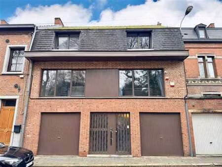 immeuble de rapport de 2 unités + garage