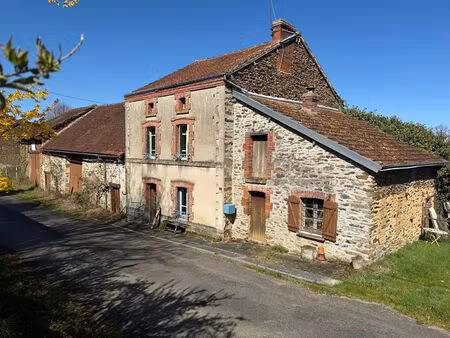 haute vienne - charmante ferme en pierre avec granges et terrain.