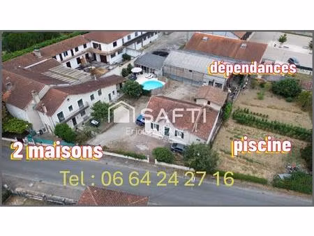 ensemble immobilier avec piscine et dépendances