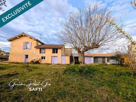 maison avec potentiel à l'entrée de portes les valence