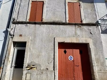 immeuble de rapport – 2 appartements + 3 garages