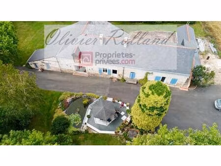 magnifique longère rénovée avec goût au coeur d'un superbe parc