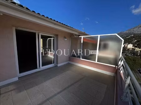 en exclusivité deux pièces complément rénové avec grande terrasse et parking  au dernier..