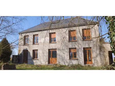 grande maison divisee en deux logements