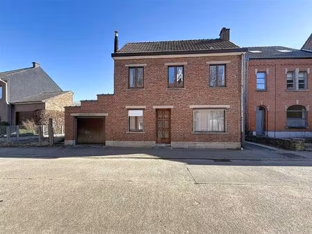 te renoveren woning met garage en tuin  opp 2a 40ca
