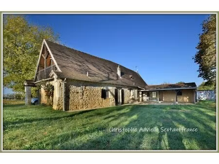 périgourdine en pierres  rénovée  3 chambres et un bureau sur terrain de 1820 m2 environ