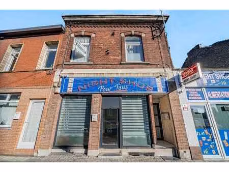 immeuble: commerce + 2 unités d'habitation