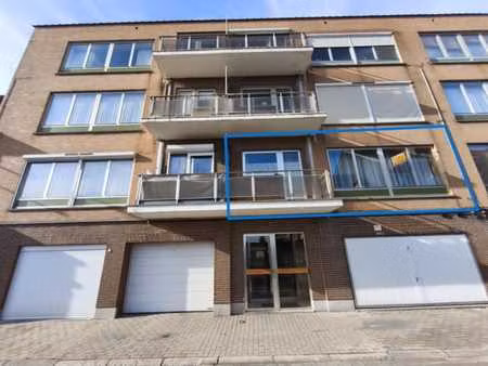 hg  rue de la poste 26/28 (app. 2ch avec garage et cave)