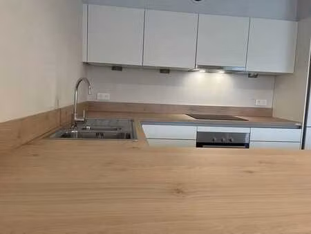 appartement 2ch - 100m2 - terrasse - garage + parking exter