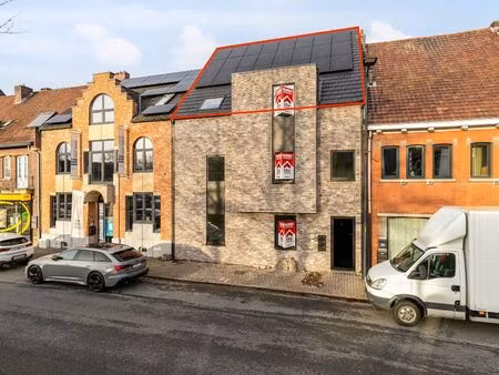 appartement à louer à bree € 940 (lm5q1) - era impact (bree) | zimmo