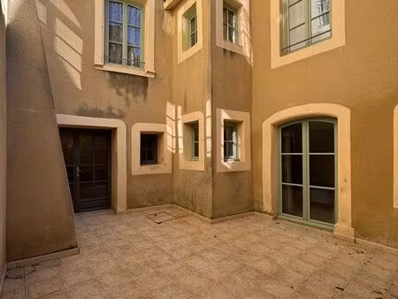 appartement t3 50m2 climatisé avec cour privative de 23m2