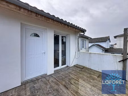 immeuble divisé en 4 appartements