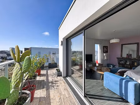 appartement dernier étage 65m²  2 chambres  terrasse  garage  ascenseur  vue scorff - lane