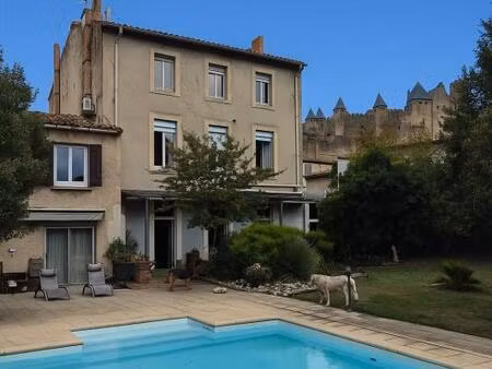 ensemble immobilier avec 2 maisons  piscine et garages