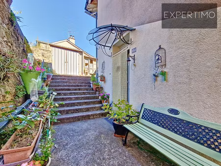 cassagnes-bégonhès – maison de village avec garage et panneaux photovoltaïques