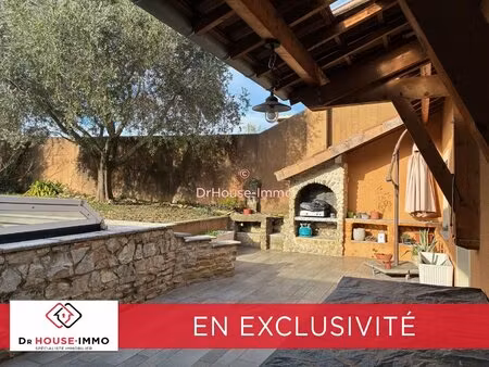 spacieuse maison de 8 pièces avec piscine et jardin paysager à portes-lès-valence