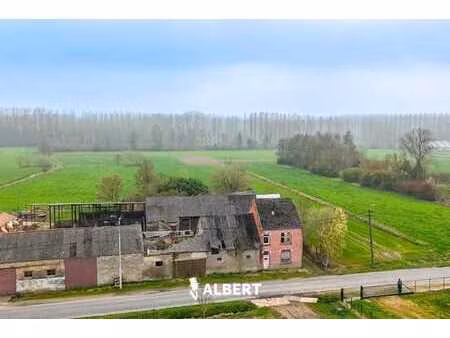 terrain de 1.330 m² avec hangar en pleine nature