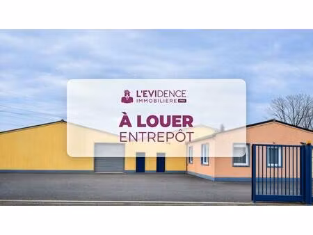 entrepôt 400 m² – idéal artisan / stockage – terrain clos – parking