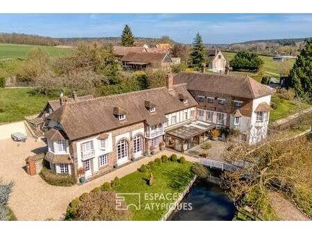 ancien moulin de caractère avec vastes dépendances