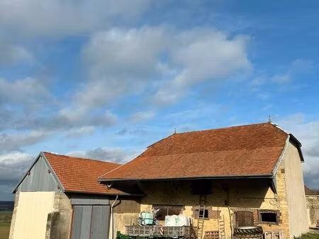 a magnant corps de ferme fort potentiel a renover sur terrain 1053m2