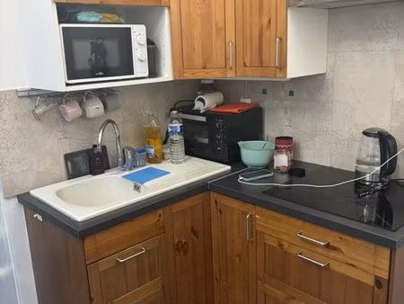 studio mansardé occupé