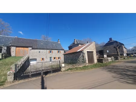 maison en pierres avec garage