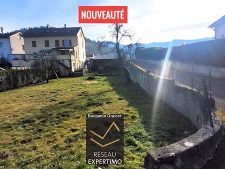 terrain constructible  plat et ensoleillé avec maison existante à gunsbach