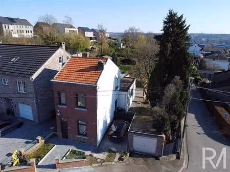 maison 4 façades rénovée avec agréable jardin à grâce-hollog