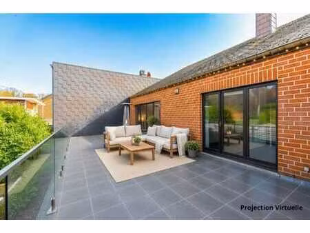 spacieux appartement avec terrasse de +/- 50 m² et parking !