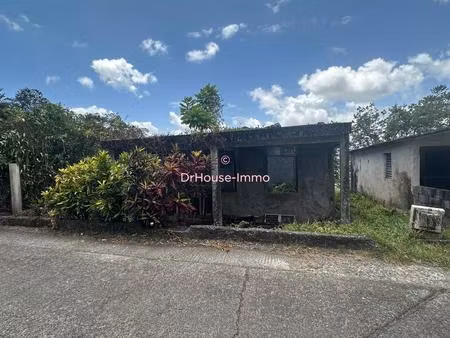 terrain de 2850m² avec bâtiment - lamentin