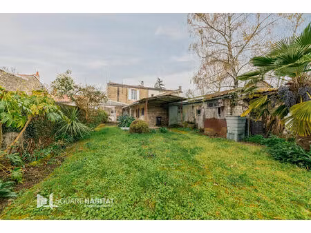 maison fontenay le comte centre ville 3 pièces / 2 chambre de 103 m2 avec jardin et garage