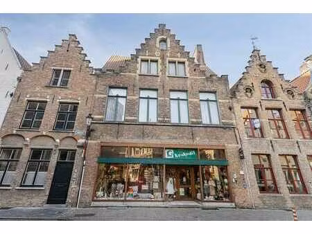 propriété commerciale avec maison à vendre à bruges