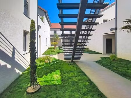 rez-de-jardin - t3 - 2 places de parking - neuf