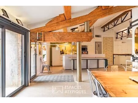 maison vigneronne réinventée en loft industriel de 297 m²