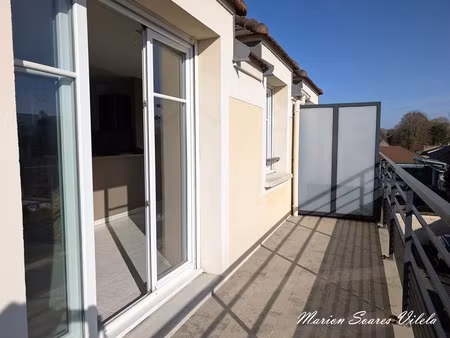 lumière  calme et extérieur : un appartement soigné dans une résidence kaufman & broad à c