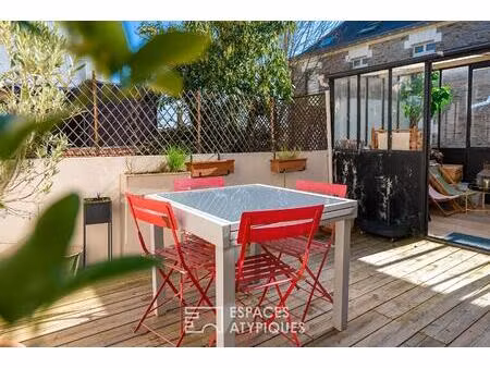 maison de ville avec terrasse et véranda au coeur des hauts pavés