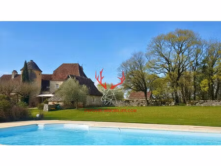 propriété de charme avec dépendances et 7 hectares dans le lot