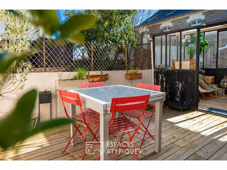 maison de ville avec terrasse et véranda au coeur des hauts pavés